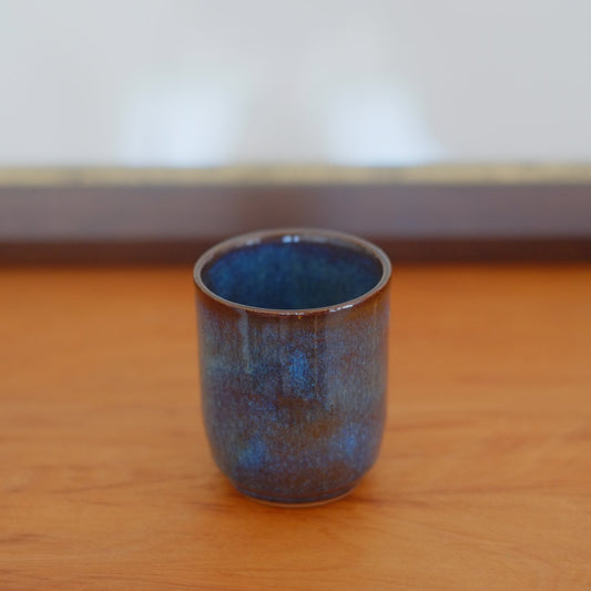 Small tumbler with indentation