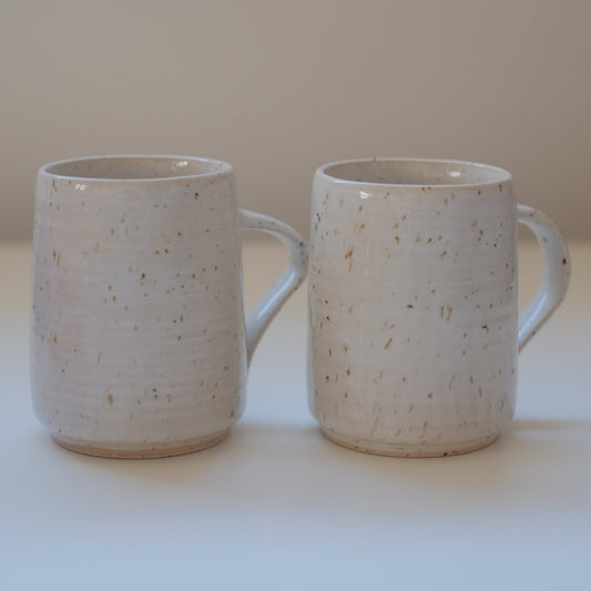 Pair of small speckled white mugs