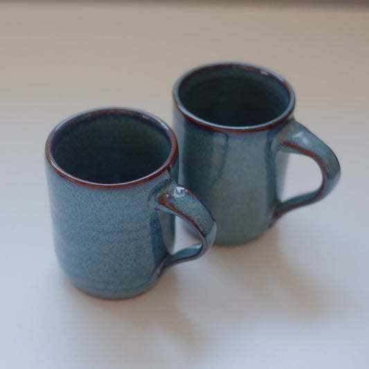 Two small mugs in variegated blue
