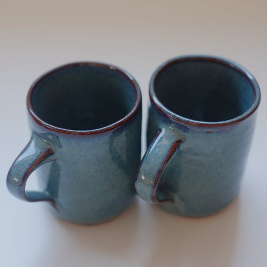 Two small mugs in variegated blue