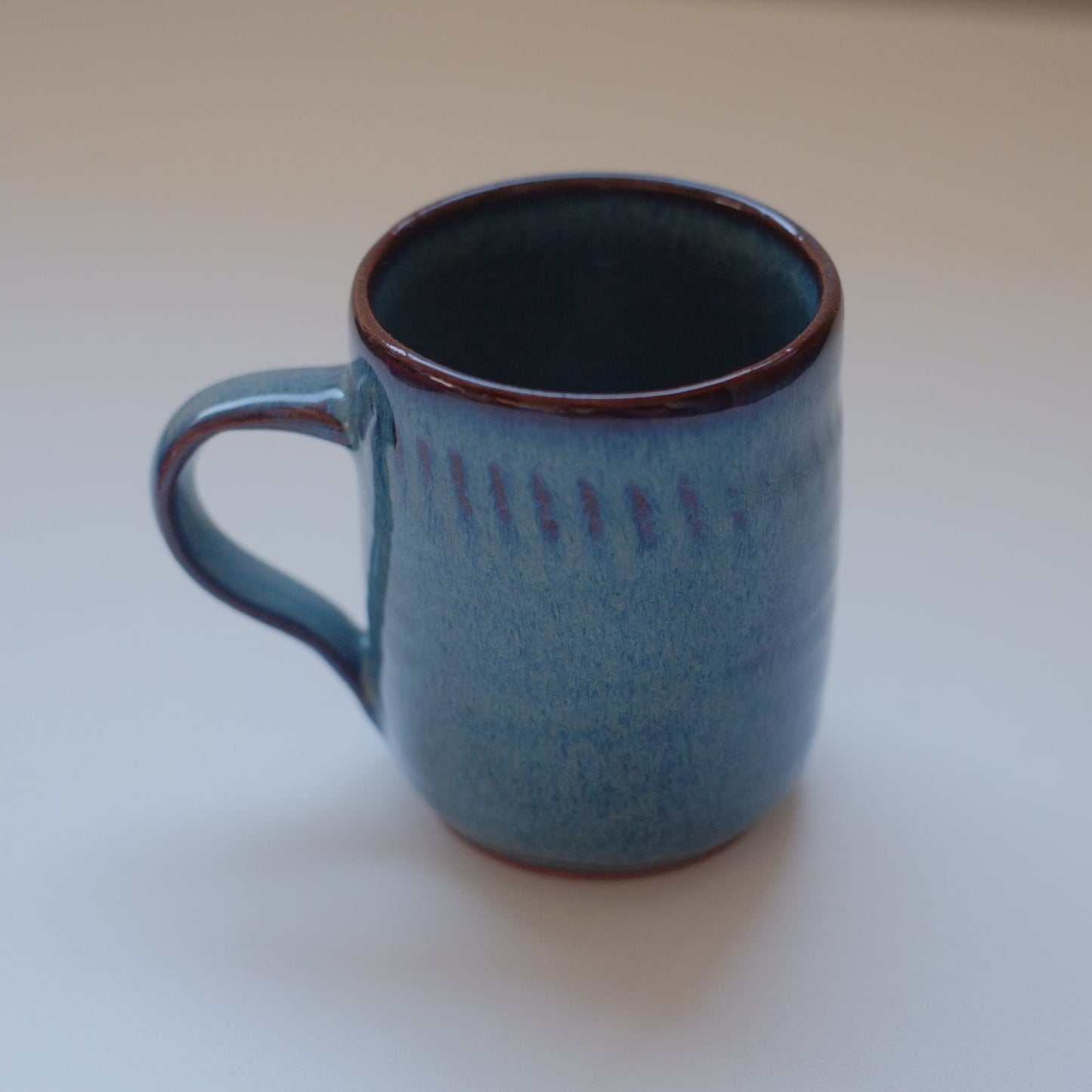 Small mug in variegated blue