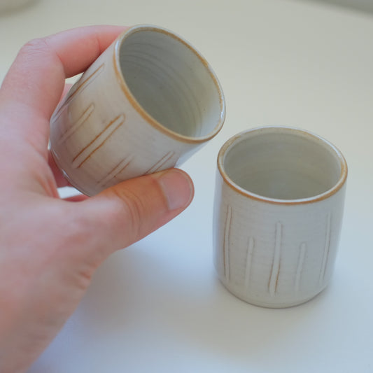 Two X-Small Cream/Tan Tumblers