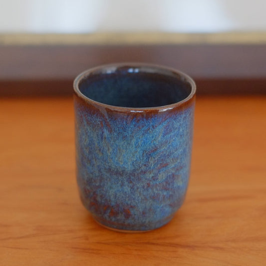 Small tumbler with indentation