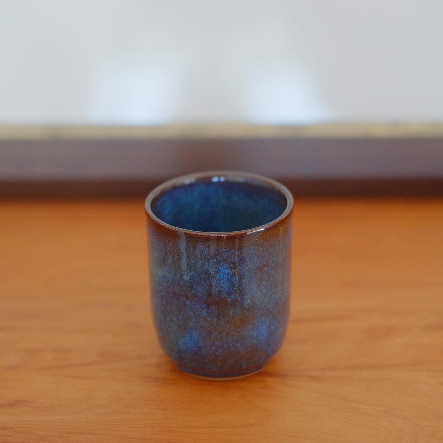 Small tumbler with indentation