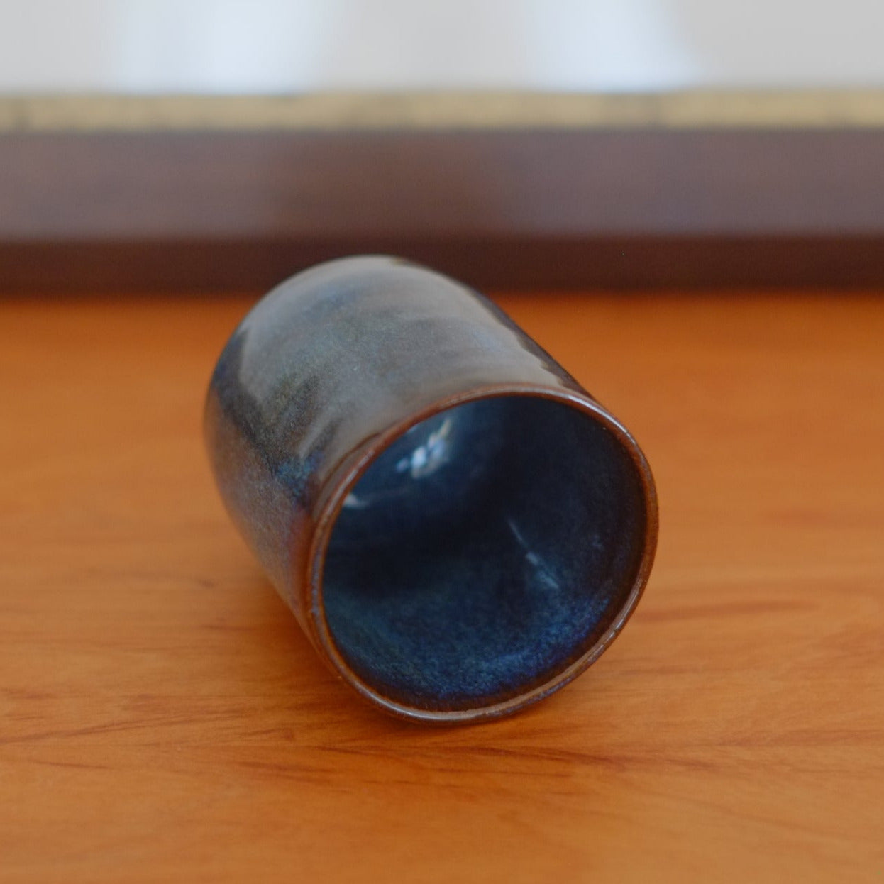 Small tumbler with indentation