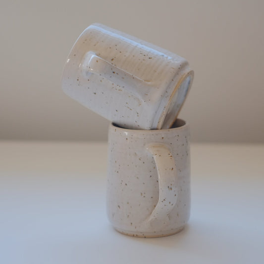 Pair of small speckled white mugs