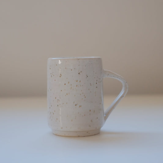 Small speckled white mug