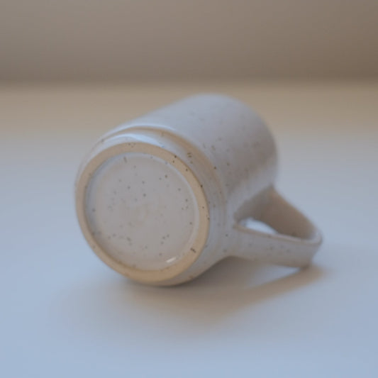 Small speckled white mug