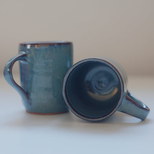 Two small mugs in variegated blue