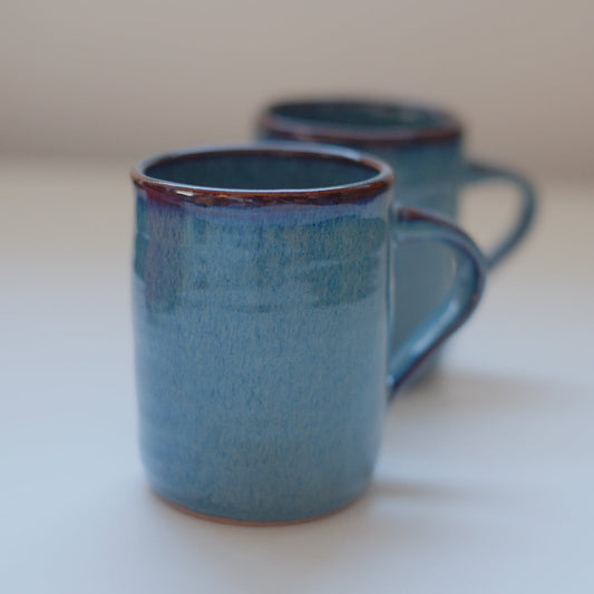 Two small mugs in variegated blue
