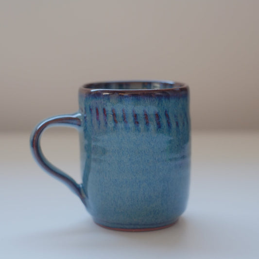 Small mug in variegated blue