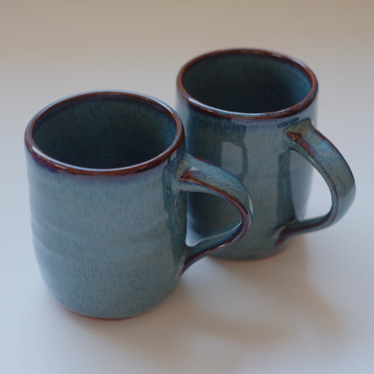 Two small mugs in variegated blue