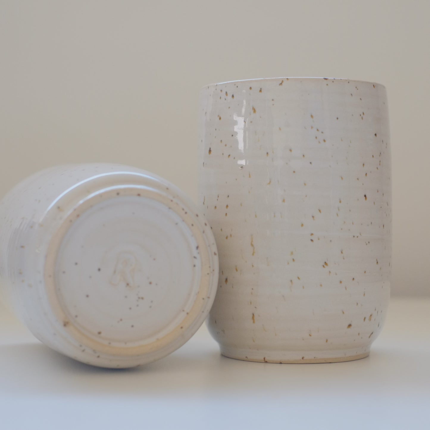 Pair of Speckled White Tumblers