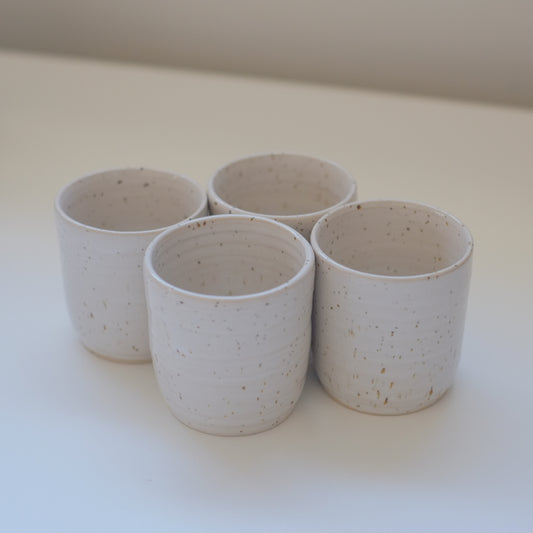 Four X-Small Speckled White Tumblers