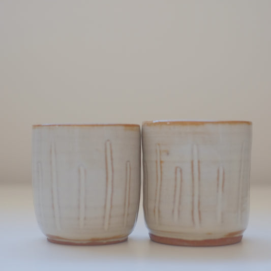 Two X-Small Cream/Tan Tumblers