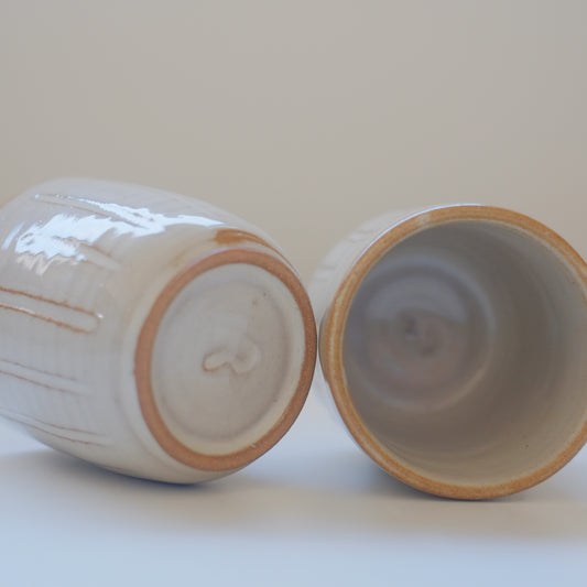 Two X-Small Cream/Tan Tumblers